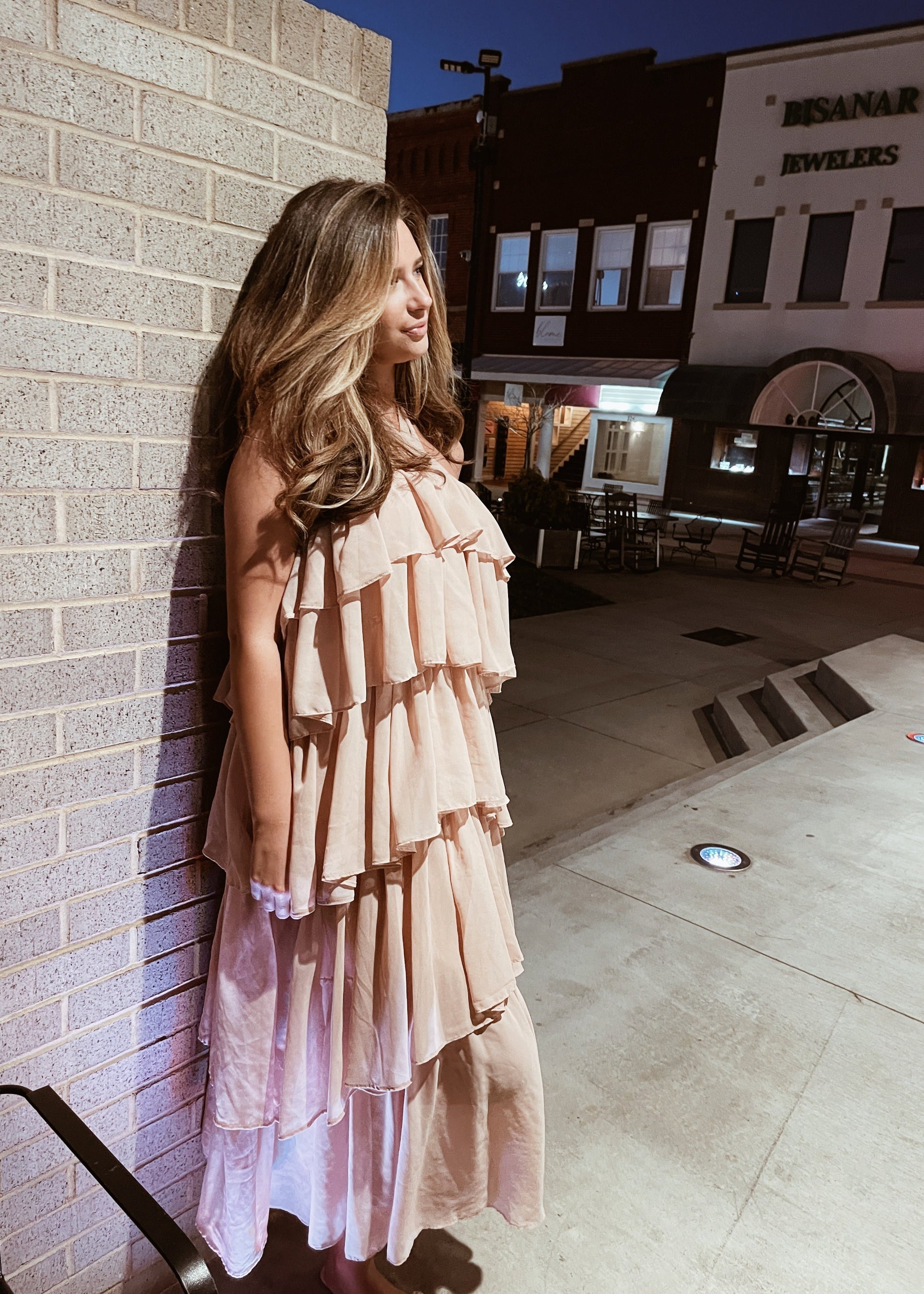 Neutral pink toned tiered ruffle maxi dress with a halter neck